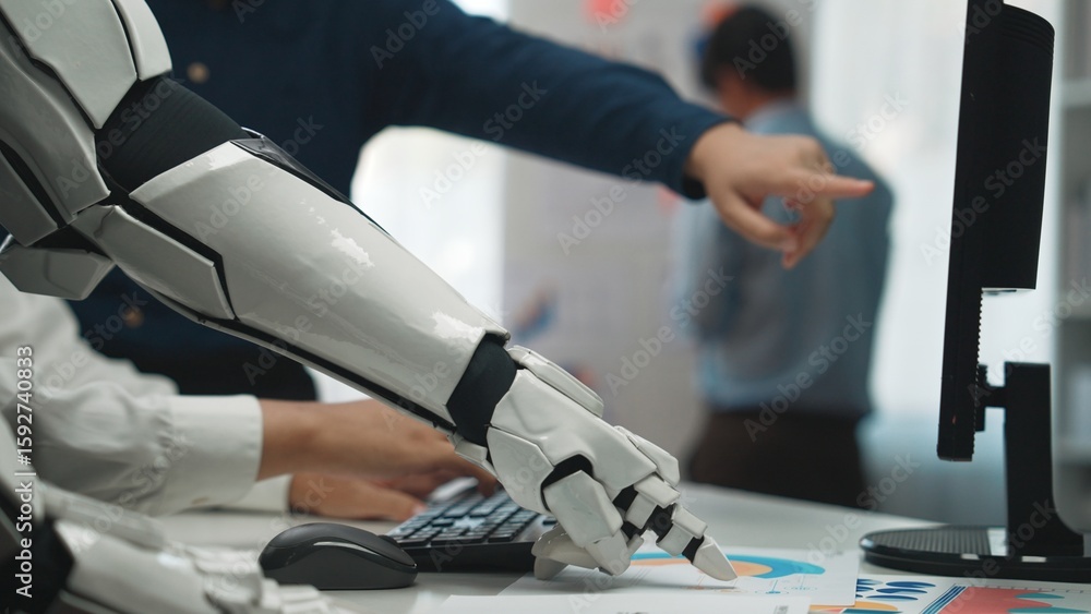 Poster a futuristic robotic arm reaching towards a computer while human colleagues engage in discussion. th