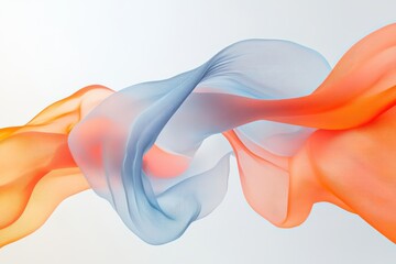 Abstract flowing silk fabric with orange and blue waves creates a dynamic background