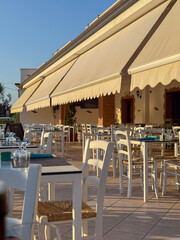 Outdoor Restaurant Terrace in Warm Evening Light, Sardinia