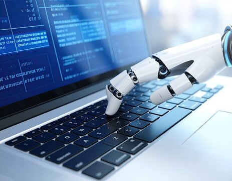 Robotic hand typing on a laptop computer