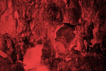 Red background, Rough textured red wall with visible cracks and dark abstract patterns, ideal for...