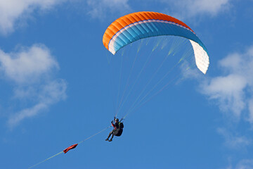 Paraglider being towed by a winch	