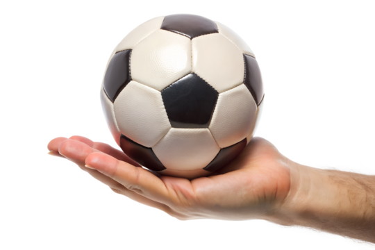 A persons hand gently holding a classic black and white soccer ball, isolated on a transparent background