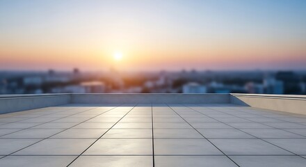 Rooftop terrace with tile flooring overlooking a blurred cityscape at sunset, bathed in warm light.