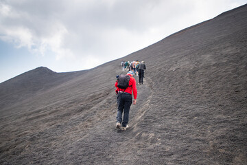 hiker trekking on mount Etna