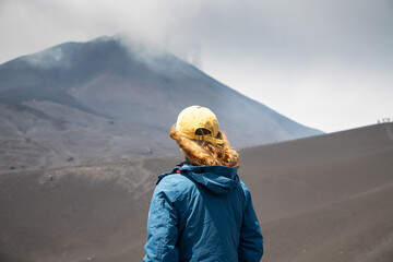 hiker trekking on mount Etna