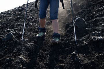 hiker trekking on mount Etna