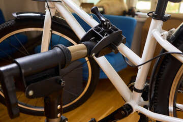 Fototapeta premium Utilizing a Bike Maintenance Setup Complete with a Repair Stand, Essential Tools, and More