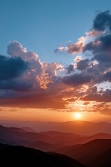 Obraz premium Breathtaking mountain sunset with dramatic clouds and vibrant sky