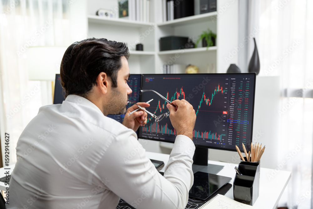 Poster smart trader businessman analyzing in two dynamic stock exchange investment screen on pc with invest