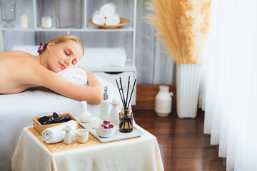 Caucasian woman customer enjoying relaxing anti-stress spa massage and pampering with beauty skin...