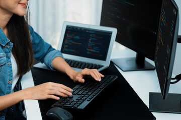 Cropped hands image of IT developer creating with typing information on pc with coding program...