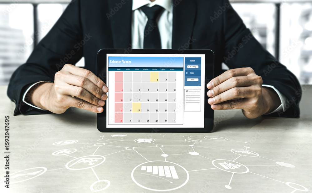 Poster calendar on computer software application for modish schedule planning for personal organizer and on