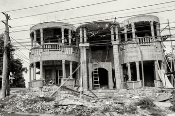 Abandoned and Crumbling Building with Makeshift Ladders
