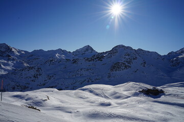 Sunny snow mountains