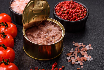 Tuna, canned fish in a can and on a plate for making sandwiches and other food. Canned tuna