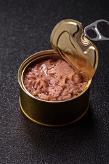 Tuna, canned fish in a can and on a plate for making sandwiches and other food. Canned tuna