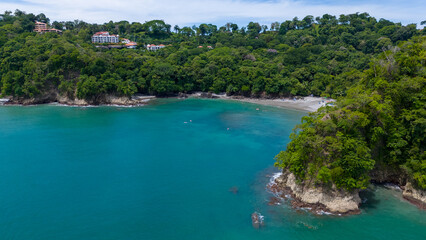 Obraz premium Biesanz Beach. Playa Biesanz in Manuel Antonio, Quepos, Costa Rica. Aerial drone top photo. White sand beach with turquoise ocean. 