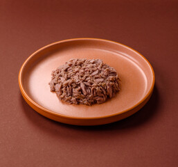 Tuna, canned fish in a can and on a plate for making sandwiches and other food. Canned tuna