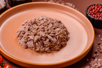 Tuna, canned fish in a can and on a plate for making sandwiches and other food. Canned tuna