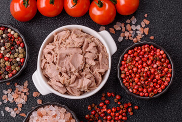 Tuna, canned fish in a can and on a plate for making sandwiches and other food. Canned tuna