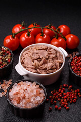 Tuna, canned fish in a can and on a plate for making sandwiches and other food. Canned tuna