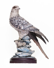 ceramic eagle figurine isolated on white background
