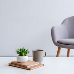 Minimalist home decor ideas featuring plant, mug, books and chair on white table top