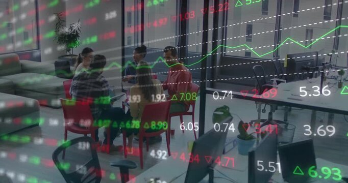 Colleagues opening laptop and sharing notes while analyzing live stock chart for business decisions