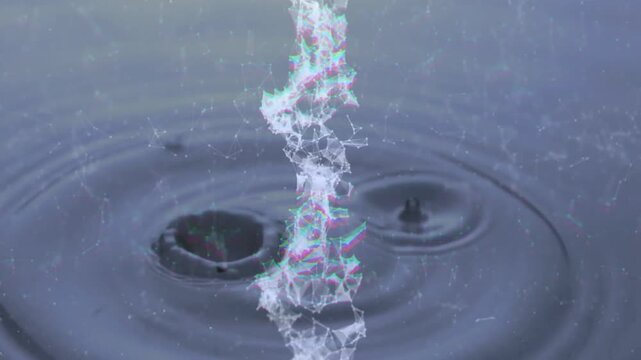 Droplet descending toward pulsating mesh column impacting water creating fluid ripples
