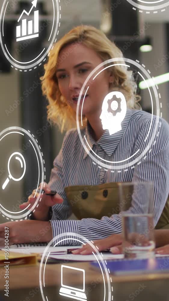 Poster animation of multiple digital icons against group of diverse colleagues discussing at office