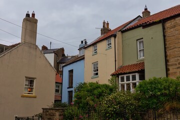 A street view of colorful houses and buildings  in Staithes - North Yorkshire - United Kingdom 
