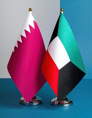 Two flags, likely national, on stands
