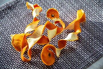 Orange peels hang to dry. A pleasant rustic perfect setting.