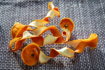 Orange peels hang to dry. A pleasant rustic perfect setting.