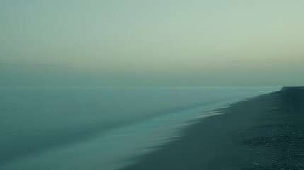 Fototapeta premium Serene Seashore at Dusk Tranquil Ocean Beach Scene