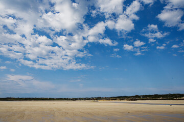 clouds over the beach