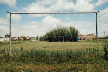 An abandoned soccer field in a rural town