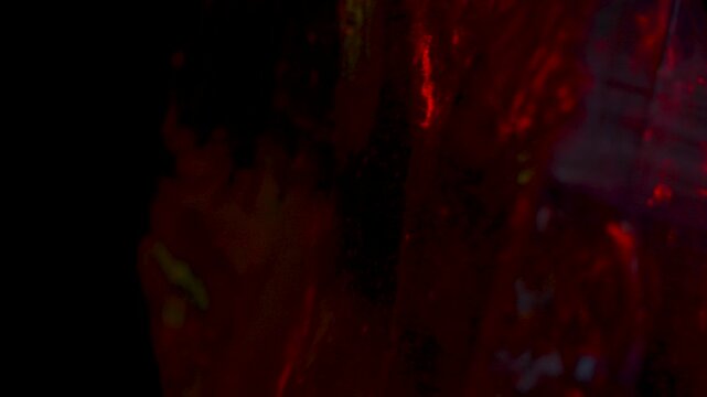 Natural crystalline structure in motion, highlighting spontaneous formations and neon glow.
