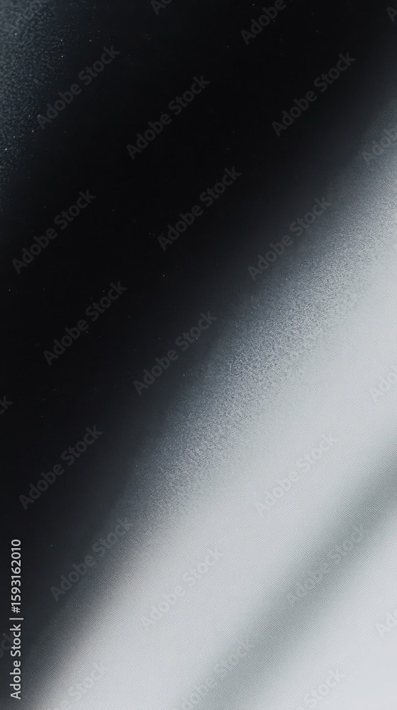 Poster abstract grayscale textured surface with diagonal light and shadow transition, clean background for 