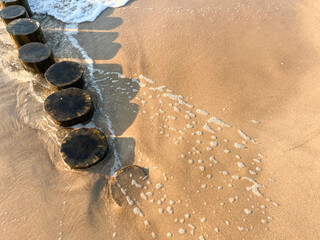 Breakwaters on the Baltic Sea coast in Mielno, Poland