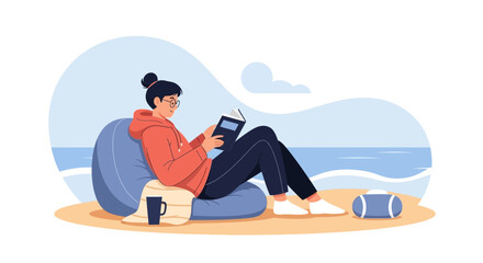 Fototapeta premium Woman Enjoying Leisure Time Reading At The Beach On A Comfortable Bean Bag