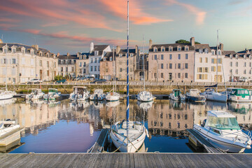 Vannes, medieval city in Brittany, boats in the harbor, with typical houses 
