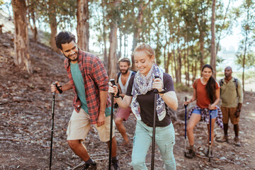 Young and diverse group of friends and hikers hiking together in the mountains of south africa