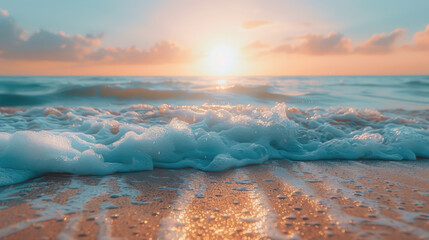 Naklejka premium Waves gently lapping on the sandy shore at sunset, creating a serene and picturesque coastal scene.