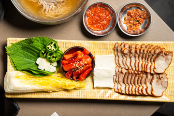 Asian Hot Pot Plate with Pork, Tofu, and Vegetables