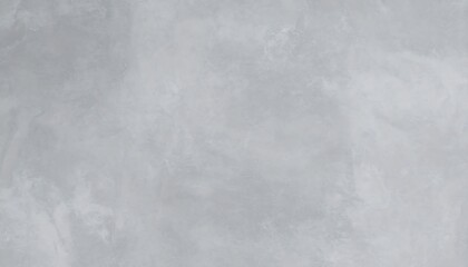 Fototapeta premium Modern gray concrete wall background with a smooth polished cement texture. Industrial loft style plaster surface for design, mockups, and copy space.