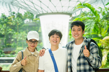 family portrait in jewelry changi airport in singapore