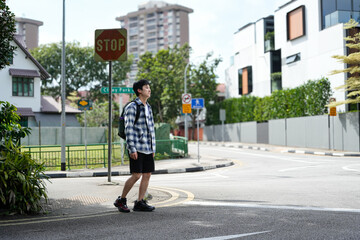 young man walking scene in pedestrians in the city environment