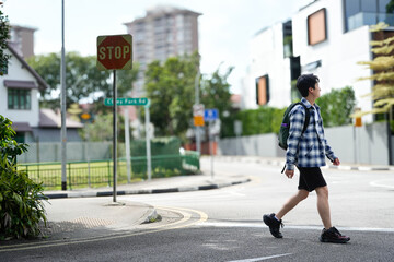 young man walking scene in pedestrians in the city environment